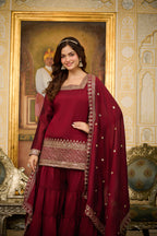 Traditional red sharara outfit for festive and wedding wear