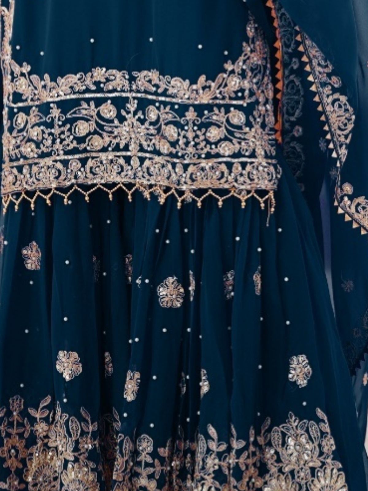 Navy blue dress with intricate gold embroidery